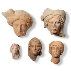 FIVE GREEK TERRACOTTA HEADS