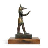 AN EGYPTIAN GOLD-INLAID BRONZE ANUBIS - photo 1