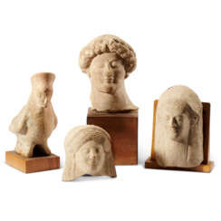 A GROUP OF FOUR GREEK TERRACOTTAS
