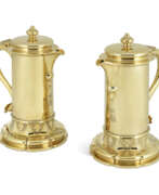 Period of George IV. TWO GEORGE IV SILVER-GILT FLAGONS