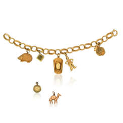 GOLD AND RUBY CHARM BRACELET