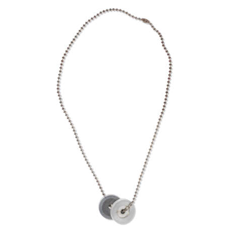 A NECKLACE WITH TWO 45 RPM ADAPTER MEDALLIONS WORN BY DJ KOOL HERC, MID 1970S - фото 1