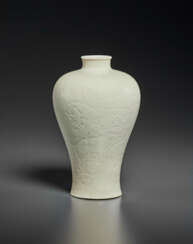A SMALL WHITE-GLAZED CARVED SOFT-PASTE VASE, MEIPING
