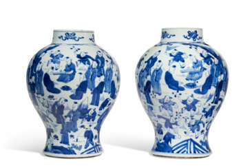 A RARE PAIR OF BLUE AND WHITE &#39;HUNDRED BOYS&#39; JARS
