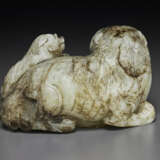 A PALE AND DARK GREY JADE CARVING OF A LION WITH CUB - photo 2