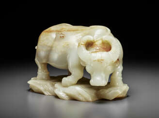 A WELL-CARVED GREYISH-WHITE JADE WATER BUFFALO-FORM WATERPOT