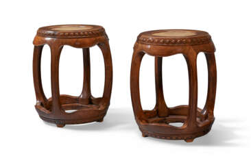 A VERY RARE PAIR OF HUANGHUALI DRUM STOOLS