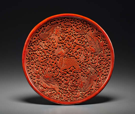 A RARE CARVED RED LACQUER `QILIN’ DISH - фото 1