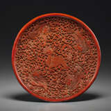 A RARE CARVED RED LACQUER `QILIN’ DISH - photo 1