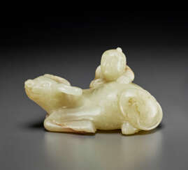 A PALE YELLOW AND BROWN JADE &#39;BUFFALO AND BOY’ GROUP