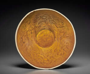 A VERY RARE MOLDED DING-TYPE GOLDEN-BROWN-GLAZED BOWL
