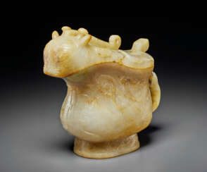 A RARE PALE BEIGE AND RUSSET JADE ARCHAISTIC GONG-FORM VESSEL AND COVER