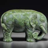 A SUPERB LARGE SPINACH-GREEN JADE FIGURE OF AN ELEPHANT - photo 1
