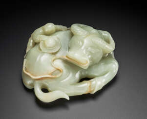 A WELL-CARVED GREENISH-WHITE JADE &#39;BUFFALO AND BOY’ GROUP