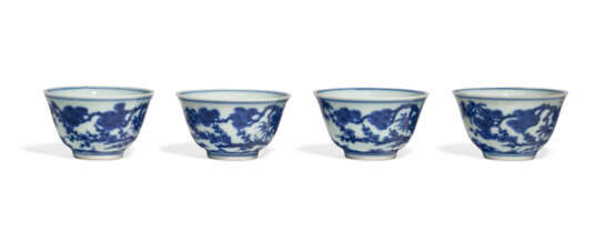 A SET OF FOUR BLUE AND WHITE CUPS - photo 1