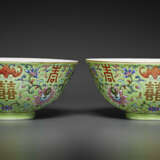 A PAIR OF FAMILLE ROSE LIME-GREEN-GROUND BOWLS - photo 1