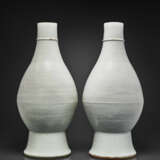 A VERY RARE PAIR OF LARGE INCISED WHITE-GLAZED VASES - photo 1