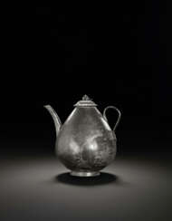 A RARE SILVER EWER AND COVER