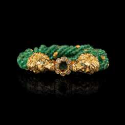 Juwelier Wilm. Smaragd-Armband mit Löwenkopf-Schließen.