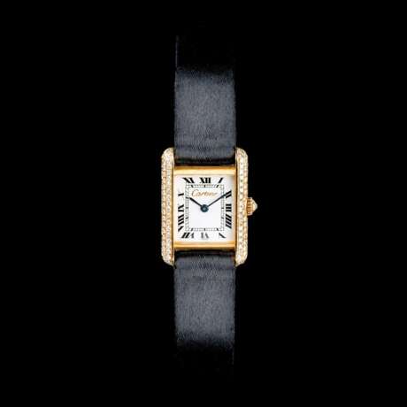 Cartier. Damen-Armbanduhr mit Diamanten 'Tank'. - photo 1