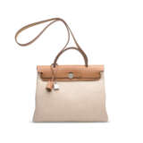 A LIMITED EDITION QUADRILLE CANVAS & NATUREL VACHE HUNTER LEATHER HERBAG ZIP 31 WITH PALLADIUM HARDWARE - photo 1