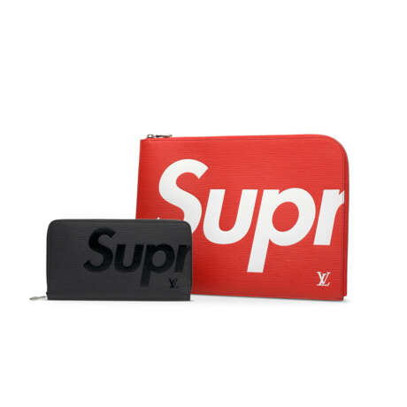 A SET OF TWO: A LIMITED EDITION BLACK EPI LEATHER ZIP PASSPORT WALLET WITH SILVER HARDWARE & A RED & WHITE EPI LEATHER POCHETTE JOUR WITH SILVER HARDWARE BY SUPREME - Foto 1
