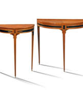 TWO DUTCH NEOCLASSICAL SATINWOOD, TULIPWOOD, PEARWOOD, RED AND BLACK-JAPANNED DEMI-LUNE CONSOLE TABLES