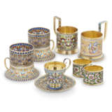 A GROUP OF CLOISONNÉ, GUILLOCHÉ AND PLIQUE-À-JOUR ENAMEL SILVER-GILT GLASS-HOLDERS, CUP AND SAUCER AND NAPKIN RINGS - фото 1