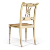 A SET OF SEVENTEEN FRENCH WHITE AND GILT-JAPANNED DINING-CHAIRS - photo 4