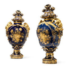 A LARGE PAIR OF BERLIN PORCELAIN DARK-BLUE-GROUND VASES AND COVERS