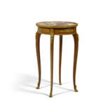 A FRENCH ORMOLU-MOUNTED MAHOGANY AND SATINE PARQUETRY GUERIDON - photo 1