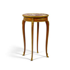 A FRENCH ORMOLU-MOUNTED MAHOGANY AND SATINE PARQUETRY GUERIDON