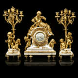 A FINE FRENCH ORMOLU AND WHITE MARBLE THREE-PIECE CLOCK GARNITURE - фото 1