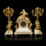 A FINE FRENCH ORMOLU AND WHITE MARBLE THREE-PIECE CLOCK GARNITURE - photo 4