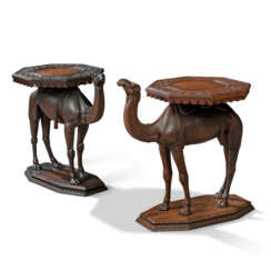 TWO ANGLO-INDIAN TEAK OCCASIONAL TABLES MODELLED AS CAMELS