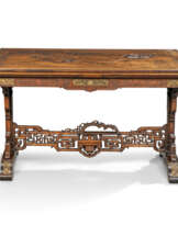 A FRENCH 'JAPONISME' GILT-BRASS-MOUNTED AND MOTHER-OF-PEARL-INLAID STAINED BEECH AND ROSEWOOD LIBRARY TABLE