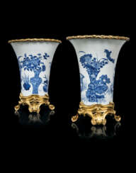 A PAIR OF LOUIS XV ORMOLU-MOUNTED CHINESE BLUE AND WHITE PORCELAIN VASES