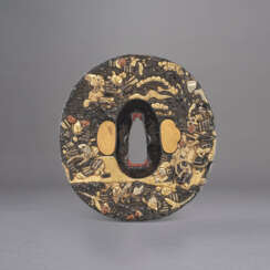 A GOLD AND SILVER DECORATED SHAKUDO TSUBA WITH WARRIORS FIGHTING