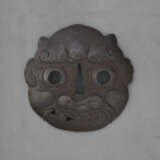 A LARGE IRON TSUBA IN THE FORM OF AN ONI MASK - фото 1