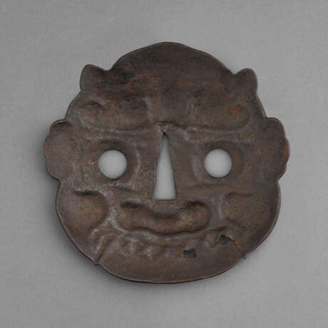 A LARGE IRON TSUBA IN THE FORM OF AN ONI MASK - фото 2