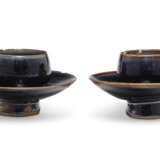 TWO SMALL BLACK-GLAZED CUP STANDS - фото 1