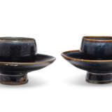 TWO SMALL BLACK-GLAZED CUP STANDS - фото 2