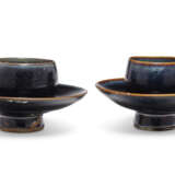 TWO SMALL BLACK-GLAZED CUP STANDS - photo 2