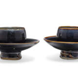 TWO SMALL BLACK-GLAZED CUP STANDS - фото 4