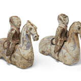 A PAIR OF PAINTED POTTERY FIGURES OF EQUESTRIANS - photo 1