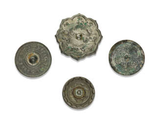 A GROUP OF FOUR SMALL SILVERY BRONZE MIRRORS