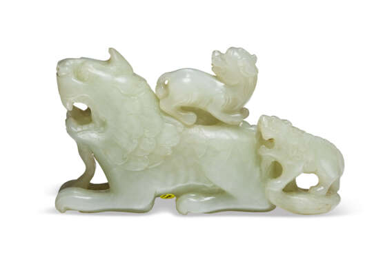 A GREENISH-WHITE JADE MYTHICAL BEAST-FORM VESSEL AND COVER - photo 1