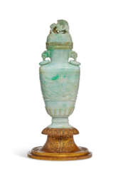 A GREYISH-WHITE AND GREEN JADEITE VASE AND COVER 