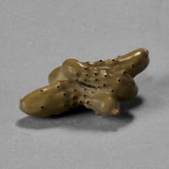 A CARVED WOOD SCULPTURE (NETSUKE) OF PICKLED CUCUMBERS AND SNOW PEA