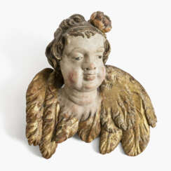 A winged putto head